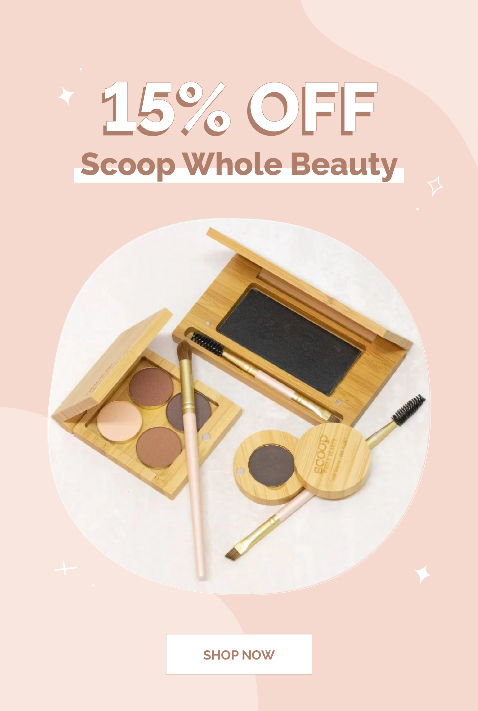 Makeup products including a palette, brushes, and a mirror on a pink background with promotional text 15% off Scoop Whole Beauty 