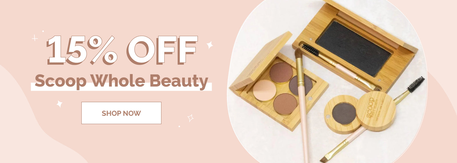 Makeup products with a '15% Off Scoop Whole Beauty' offer on a pink background.